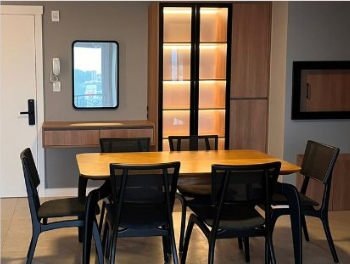 Quarto elegante com móveis sob medida